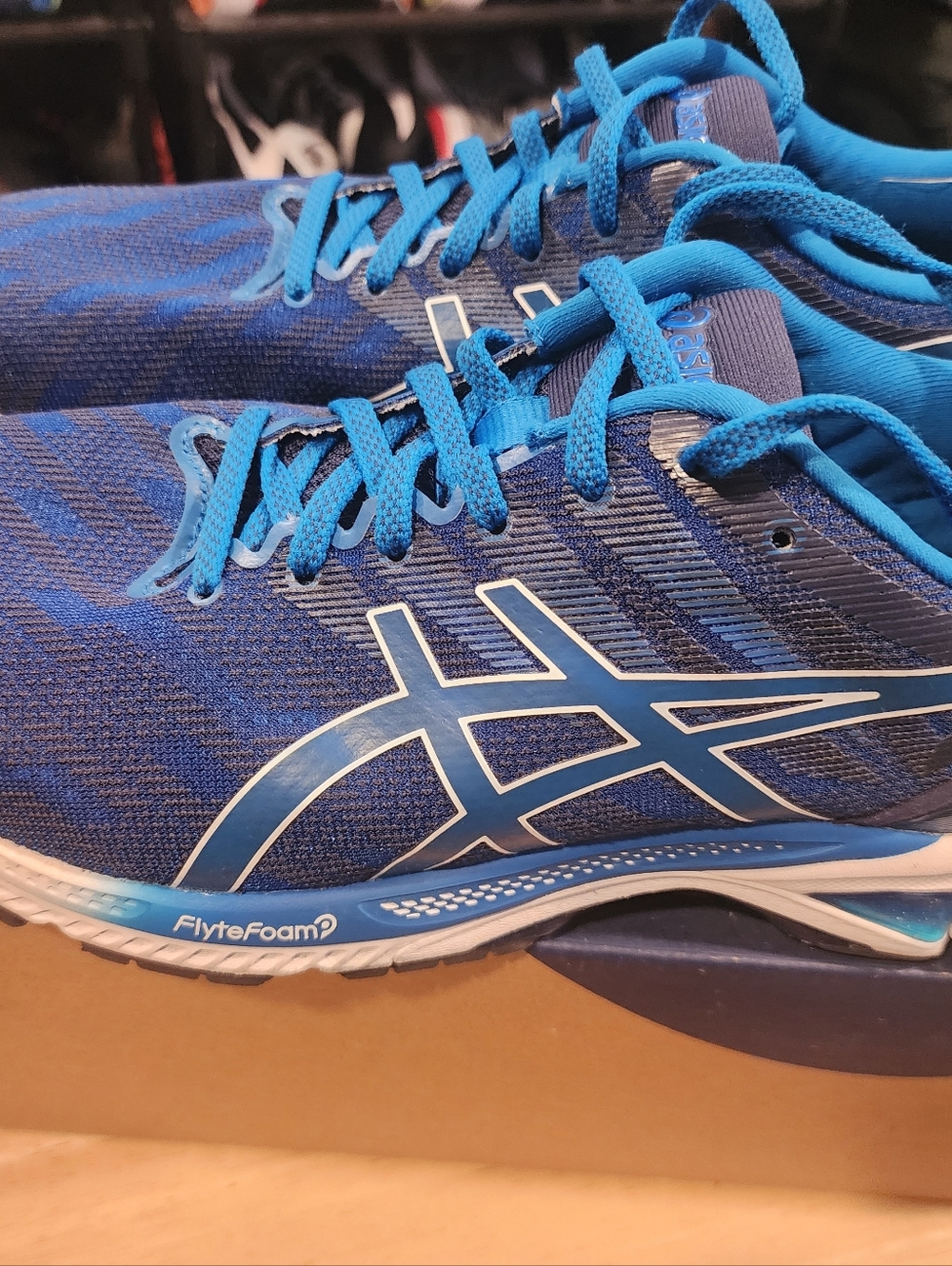 Asics Blue Mesh Running Shoes with Light Blue Accents